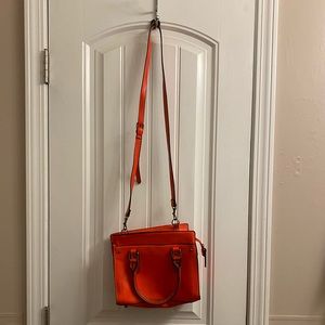 Red/orange shoulder bag or crossbody. Good condition.